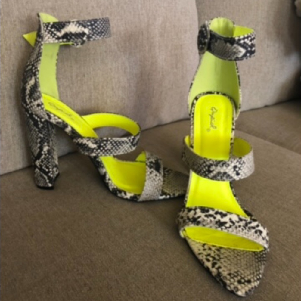 Size 9. Snake skin print high heels. Worn once.